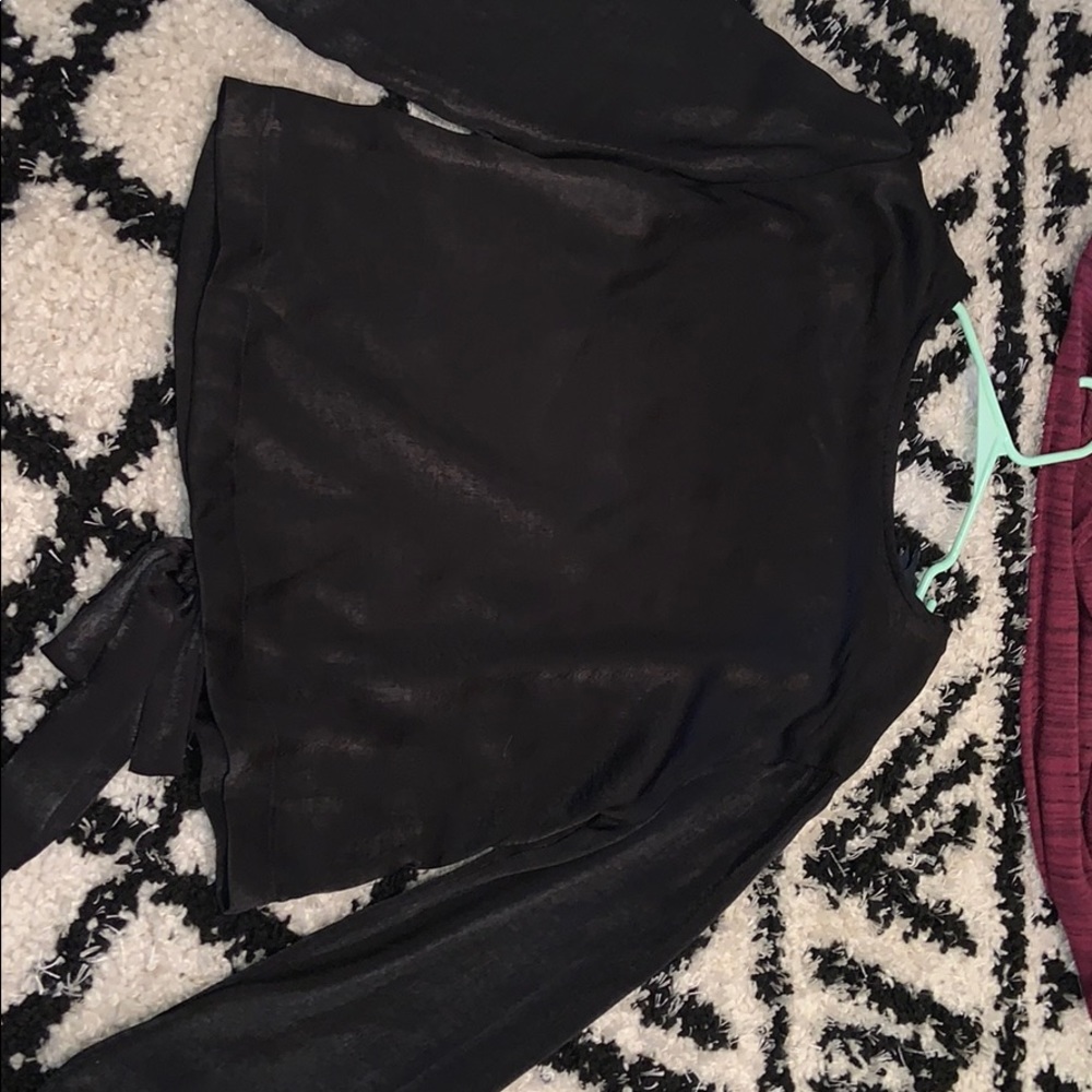 Long sleeve black dress up shirt.